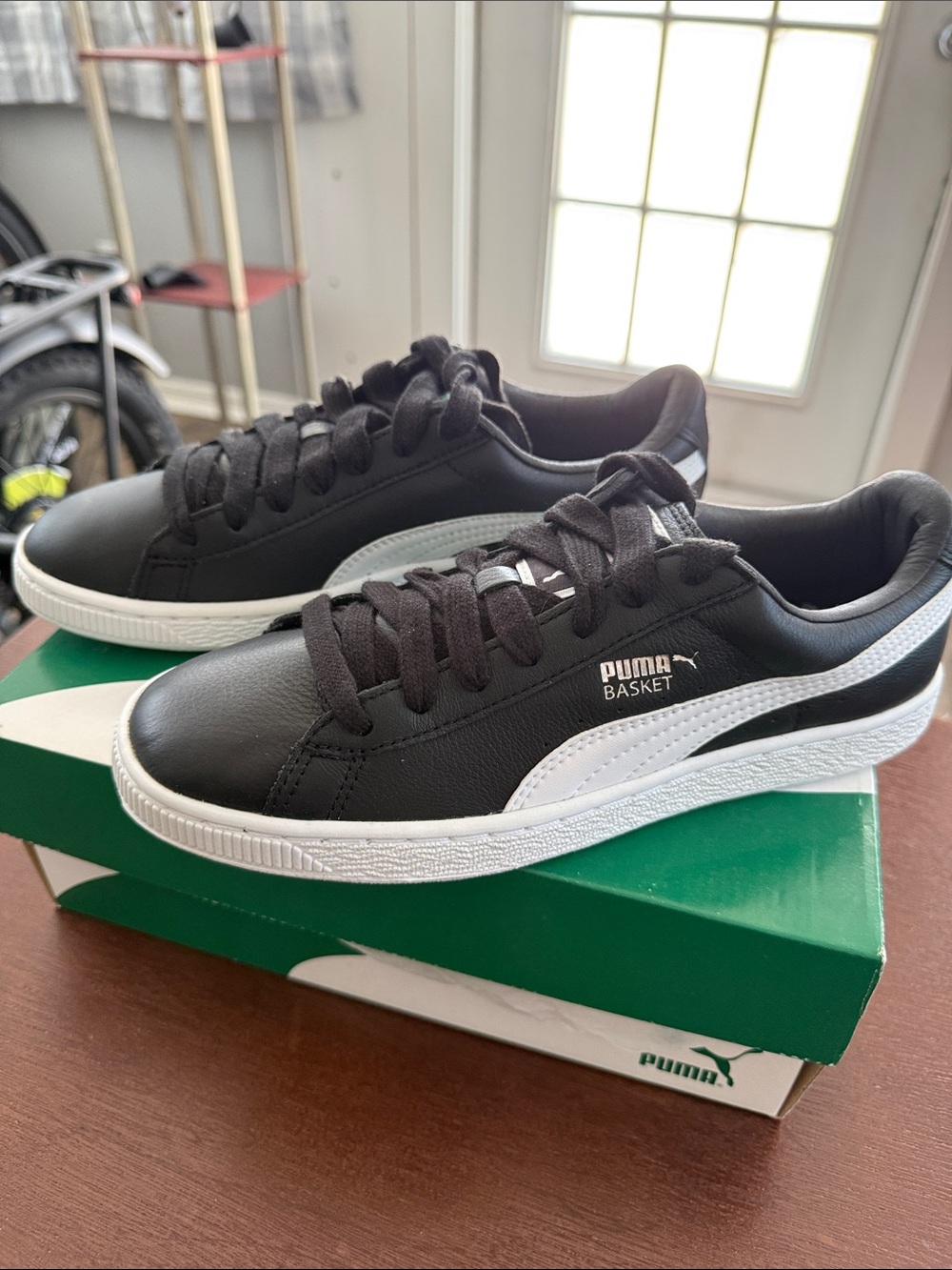 Puma Basket Leather Low-Top Sneakers in Black and White